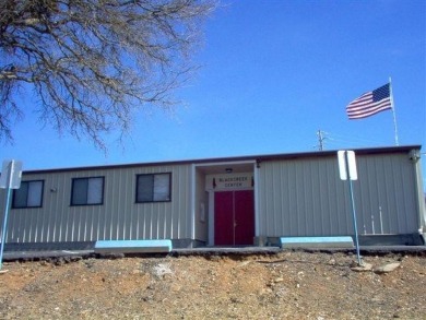 Ready to build lot with Peek-a-Boo views of the lake and on The Club at Copper Valley Golf Course in California - for sale on GolfHomes.com, golf home, golf lot