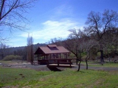 Ready to build lot with Peek-a-Boo views of the lake and on The Club at Copper Valley Golf Course in California - for sale on GolfHomes.com, golf home, golf lot