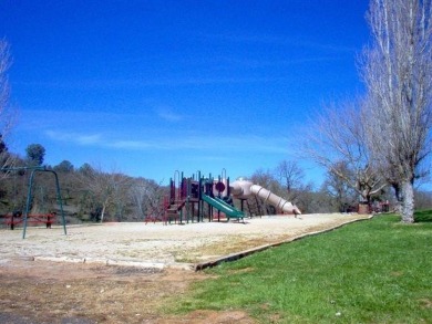 Ready to build lot with Peek-a-Boo views of the lake and on The Club at Copper Valley Golf Course in California - for sale on GolfHomes.com, golf home, golf lot