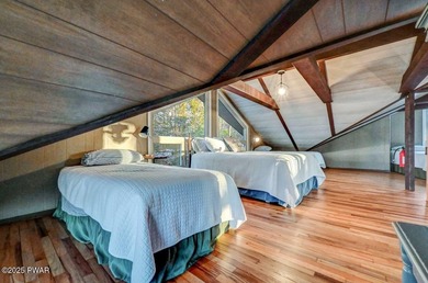 Stunning Roamingwood Lakefront Retreat in The Hideout - Fully on The Hideout Golf in Pennsylvania - for sale on GolfHomes.com, golf home, golf lot