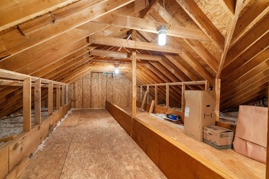 Experience refined living at 311 Katy Lane, perfectly positioned on Monticello Golf Club At Savannah Lakes in South Carolina - for sale on GolfHomes.com, golf home, golf lot