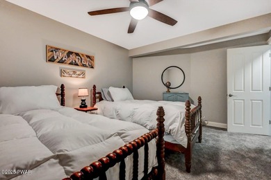 Stunning Roamingwood Lakefront Retreat in The Hideout - Fully on The Hideout Golf in Pennsylvania - for sale on GolfHomes.com, golf home, golf lot