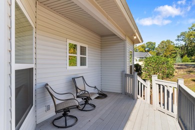 Experience refined living at 311 Katy Lane, perfectly positioned on Monticello Golf Club At Savannah Lakes in South Carolina - for sale on GolfHomes.com, golf home, golf lot