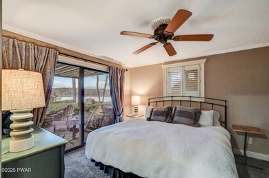 Stunning Roamingwood Lakefront Retreat in The Hideout - Fully on The Hideout Golf in Pennsylvania - for sale on GolfHomes.com, golf home, golf lot