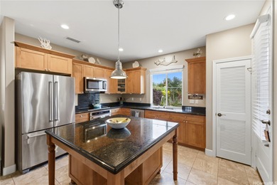 A WOW factor backyard, a main level bedroom w/full bath, and a on Hoakalei Country Club At Ocean Pointe in Hawaii - for sale on GolfHomes.com, golf home, golf lot