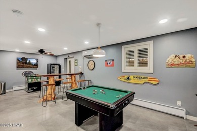 Stunning Roamingwood Lakefront Retreat in The Hideout - Fully on The Hideout Golf in Pennsylvania - for sale on GolfHomes.com, golf home, golf lot