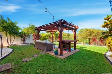 A WOW factor backyard, a main level bedroom w/full bath, and a on Hoakalei Country Club At Ocean Pointe in Hawaii - for sale on GolfHomes.com, golf home, golf lot