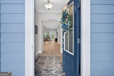 Welcome to this stunning coastal retreat in prestigious Savannah on Savannah Quarters Country Club in Georgia - for sale on GolfHomes.com, golf home, golf lot