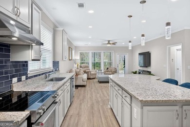 Welcome to this stunning coastal retreat in prestigious Savannah on Savannah Quarters Country Club in Georgia - for sale on GolfHomes.com, golf home, golf lot