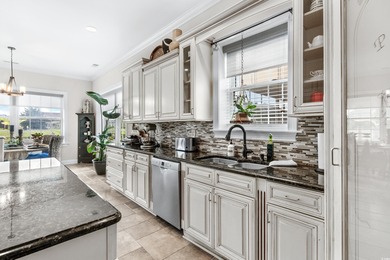 Located within the gated Intracoastal Waterway community of The on Myrtlewood Golf Course and Club  in South Carolina - for sale on GolfHomes.com, golf home, golf lot