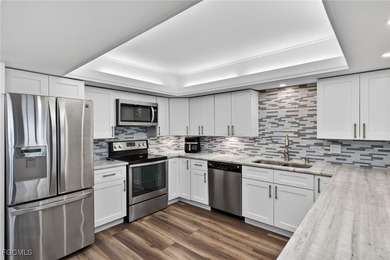 4407 E Mainmast Ct is one of those homes that instantly feels on The Landings Yacht, Golf and Tennis Club in Florida - for sale on GolfHomes.com, golf home, golf lot