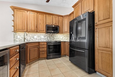 Beautiful partially exposed ranch condo overlooking the Red Barn on Red Barn Golf Course in Illinois - for sale on GolfHomes.com, golf home, golf lot