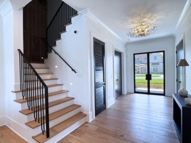 Experience refined coastal living at its finest in this on Camp Creek Golf Course in Florida - for sale on GolfHomes.com, golf home, golf lot