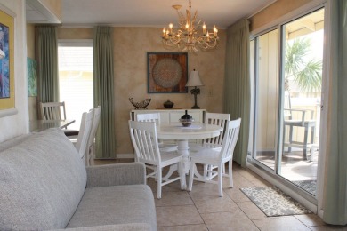 Charming 1-Bedroom Condo with Golf Course & Canal Views in on Sandpiper Cove Golf Course in Florida - for sale on GolfHomes.com, golf home, golf lot