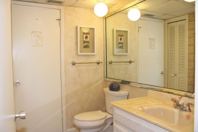 Charming 1-Bedroom Condo with Golf Course & Canal Views in on Sandpiper Cove Golf Course in Florida - for sale on GolfHomes.com, golf home, golf lot