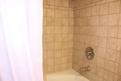 Charming 1-Bedroom Condo with Golf Course & Canal Views in on Sandpiper Cove Golf Course in Florida - for sale on GolfHomes.com, golf home, golf lot