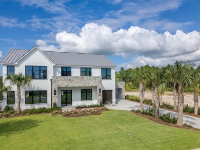 Experience refined coastal living at its finest in this on Camp Creek Golf Course in Florida - for sale on GolfHomes.com, golf home, golf lot