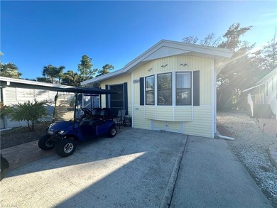 This charming cottage-style mobile home is located in the serene on Copperleaf Golf Club in Florida - for sale on GolfHomes.com, golf home, golf lot