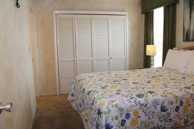 Charming 1-Bedroom Condo with Golf Course & Canal Views in on Sandpiper Cove Golf Course in Florida - for sale on GolfHomes.com, golf home, golf lot
