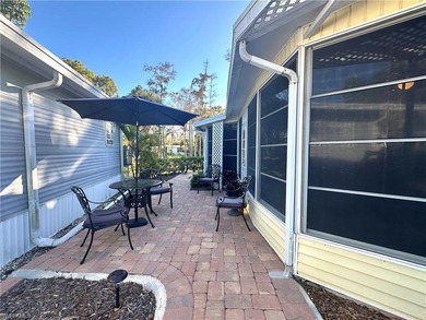 This charming cottage-style mobile home is located in the serene on Copperleaf Golf Club in Florida - for sale on GolfHomes.com, golf home, golf lot