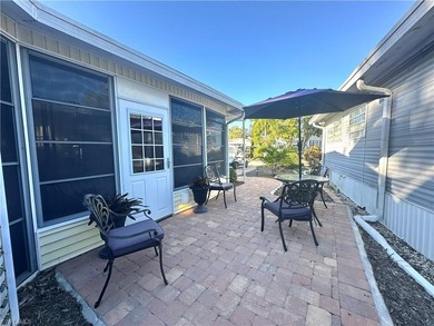 This charming cottage-style mobile home is located in the serene on Copperleaf Golf Club in Florida - for sale on GolfHomes.com, golf home, golf lot