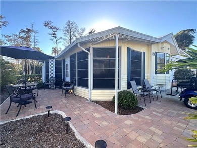 This charming cottage-style mobile home is located in the serene on Copperleaf Golf Club in Florida - for sale on GolfHomes.com, golf home, golf lot