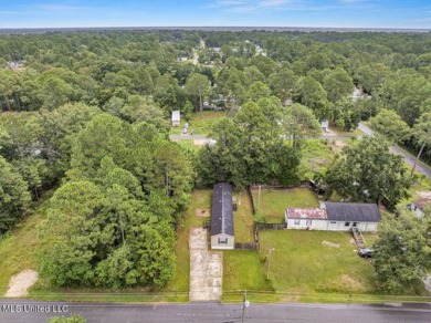 Charming 3-bedroom, 2-bath home nestled in the heart of Gautier on Mississippi National Golf Course in Mississippi - for sale on GolfHomes.com, golf home, golf lot