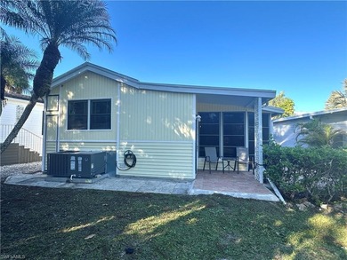 This charming cottage-style mobile home is located in the serene on Copperleaf Golf Club in Florida - for sale on GolfHomes.com, golf home, golf lot