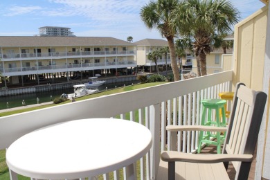 Charming 1-Bedroom Condo with Golf Course & Canal Views in on Sandpiper Cove Golf Course in Florida - for sale on GolfHomes.com, golf home, golf lot