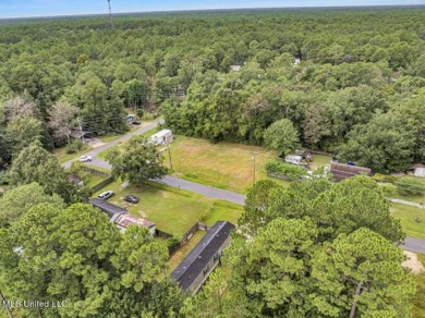 Charming 3-bedroom, 2-bath home nestled in the heart of Gautier on Mississippi National Golf Course in Mississippi - for sale on GolfHomes.com, golf home, golf lot