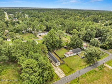 Charming 3-bedroom, 2-bath home nestled in the heart of Gautier on Mississippi National Golf Course in Mississippi - for sale on GolfHomes.com, golf home, golf lot