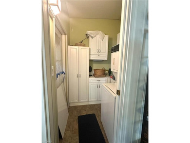 This charming cottage-style mobile home is located in the serene on Copperleaf Golf Club in Florida - for sale on GolfHomes.com, golf home, golf lot