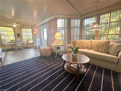 This charming cottage-style mobile home is located in the serene on Copperleaf Golf Club in Florida - for sale on GolfHomes.com, golf home, golf lot