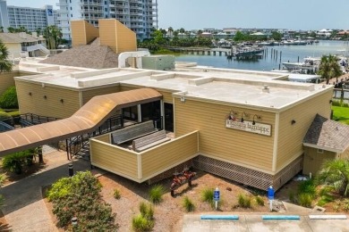 Charming 1-Bedroom Condo with Golf Course & Canal Views in on Sandpiper Cove Golf Course in Florida - for sale on GolfHomes.com, golf home, golf lot