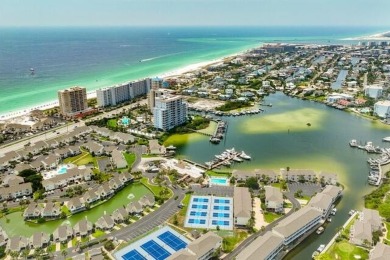 Charming 1-Bedroom Condo with Golf Course & Canal Views in on Sandpiper Cove Golf Course in Florida - for sale on GolfHomes.com, golf home, golf lot