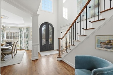 Discover an exceptional home in the highly sought-after, gated on Alpharetta Athletic Club East in Georgia - for sale on GolfHomes.com, golf home, golf lot