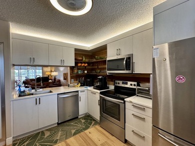 Rare 4th-top floor, corner condo with beautiful golf course on Poinciana Golf Club in Florida - for sale on GolfHomes.com, golf home, golf lot