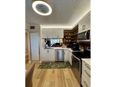 Rare 4th-top floor, corner condo with beautiful golf course on Poinciana Golf Club in Florida - for sale on GolfHomes.com, golf home, golf lot