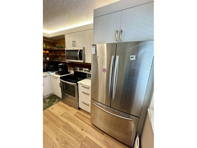 Rare 4th-top floor, corner condo with beautiful golf course on Poinciana Golf Club in Florida - for sale on GolfHomes.com, golf home, golf lot