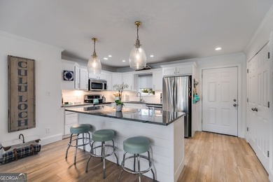 Experience lakefront living at its finest in this fully updated on Fairfield Plantation Golf and Country Club in Georgia - for sale on GolfHomes.com, golf home, golf lot