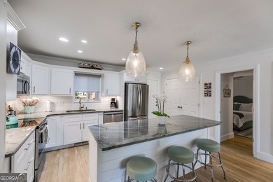 Experience lakefront living at its finest in this fully updated on Fairfield Plantation Golf and Country Club in Georgia - for sale on GolfHomes.com, golf home, golf lot