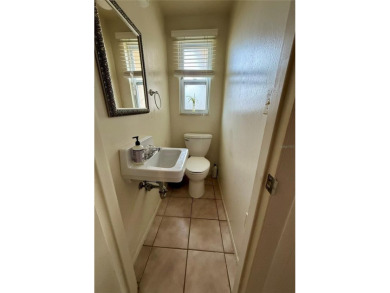 Discover Florida living in this inviting 2-bedroom, 1.5-bathroom on Venice East Golf Club in Florida - for sale on GolfHomes.com, golf home, golf lot
