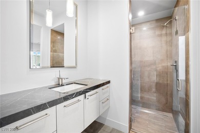 Beautiful modern one story townhouse at MacDonald Highlands with on Dragon Ridge Country Club in Nevada - for sale on GolfHomes.com, golf home, golf lot