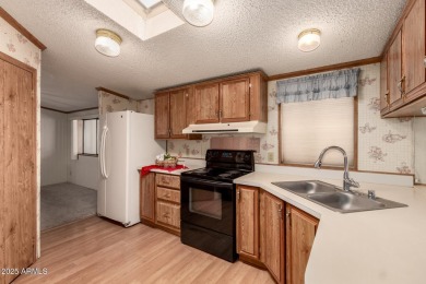 This charming home is now available to purchase in Beautiful Sun on Sun Lakes Country Club in Arizona - for sale on GolfHomes.com, golf home, golf lot