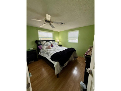 Discover Florida living in this inviting 2-bedroom, 1.5-bathroom on Venice East Golf Club in Florida - for sale on GolfHomes.com, golf home, golf lot