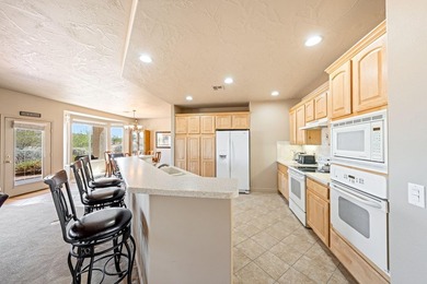 This charming 3-bedroom, 2-bathroom home with a 2-car garage on Sunriver Golf Club in Utah - for sale on GolfHomes.com, golf home, golf lot