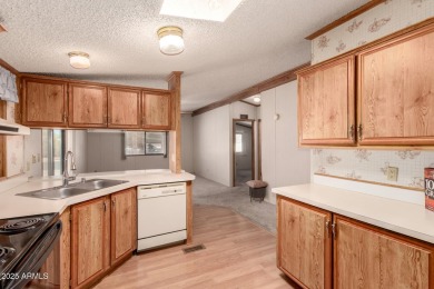 This charming home is now available to purchase in Beautiful Sun on Sun Lakes Country Club in Arizona - for sale on GolfHomes.com, golf home, golf lot