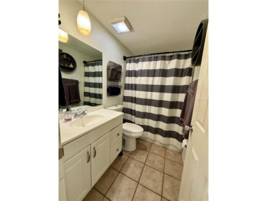 Discover Florida living in this inviting 2-bedroom, 1.5-bathroom on Venice East Golf Club in Florida - for sale on GolfHomes.com, golf home, golf lot