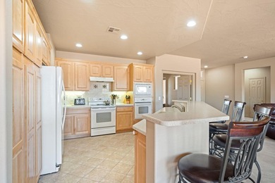 This charming 3-bedroom, 2-bathroom home with a 2-car garage on Sunriver Golf Club in Utah - for sale on GolfHomes.com, golf home, golf lot