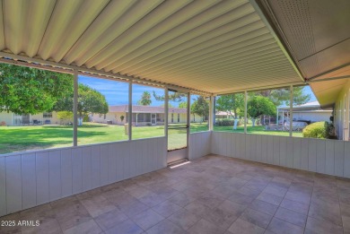 In the heart of Sun City, just steps from the lush Greenbelt and on PalmBrook Country Club in Arizona - for sale on GolfHomes.com, golf home, golf lot